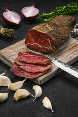 Beef jerky on cutting board