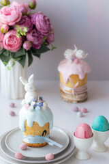 Easter cake kulich. Traditional Easter sweet bread decorated meringue.