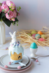 Easter cake kulich. Traditional Easter sweet bread decorated meringue.