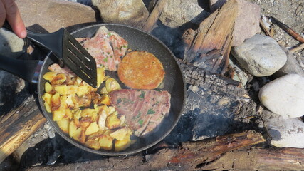 cooking  tuna on the grill in nature