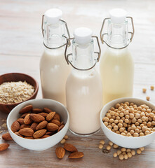 Bottles with different vegetable milk