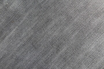 Fototapeta na wymiar Gray jean cloth background. Denim texture banner background. Jeans apparel texture.