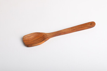 wooden spoon on white background.