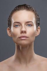 The doctor cosmetologist makes the Rejuvenating facial injections procedure for tightening and smoothing wrinkles on the face skin of a women in a beauty salon. Cosmetology skin care