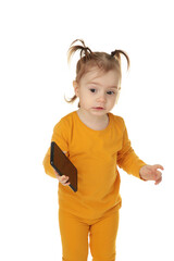 Trendy little girl with smartphone isolated on white background. Top view