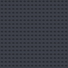 Grey background with circular indentations. Seamless geometric pattern with circles.