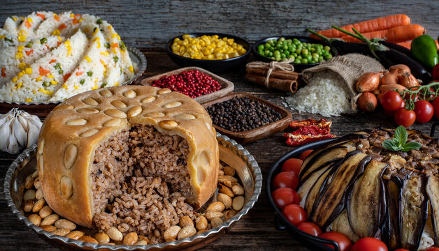 Local foods concept. Different kinds of pilaf on the table. Perde pilavı and ters çevirme pilav