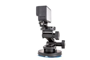 New 4K action camera on a tripod in black color. Isolated white background