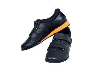 Black weightlifting shoes, on a white background isolated
