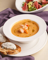 Delicious fresh cream soup. Soup with bruschetta. Restaurant menu