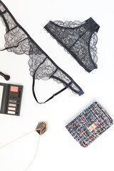Shopping and fashion concept. Set of glamorous stylish sexy lace lingerie with cosmetic products, woman accessories on white background. Top view point, flat lay