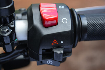 Close up of a Himalayan handle bar with engine kill switch
