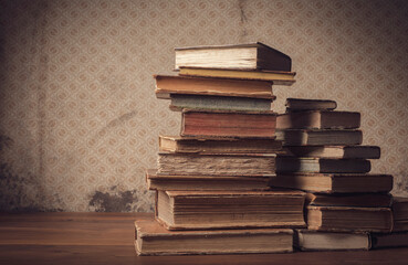 Old hardcover books on the table