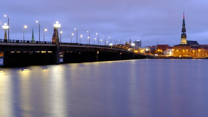 Fototapeta premium Cloudy morning, clouds over the Daugava in Riga, Peter's Cathedral