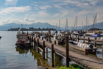 boats in Gstadt lake Chiemsee in the bavarian alps in Germany