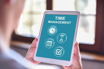 Time management concept on a tablet