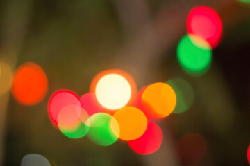 Blurred colorful bokeh lights in the night