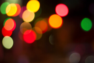 Blurred colorful bokeh lights in the night