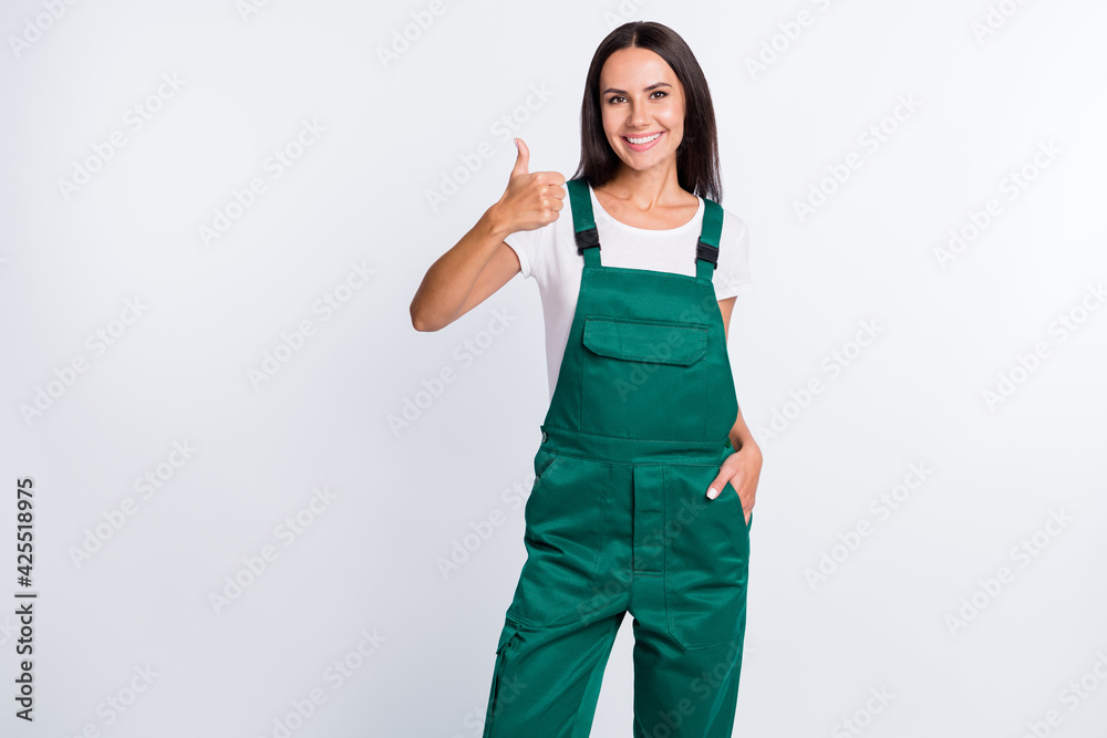 Canvas Prints photo of cheerful lady raise thumb up hand pocket toothy smile wear green overall isolated white col