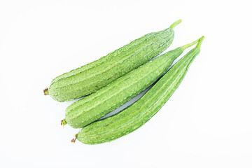 Fresh angular loofah on white background