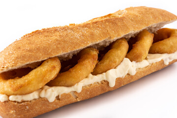 Calamari rings sandwich isolated on white background, typical food from Madrid