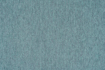 Pastel background. Background made of natural fabric. Texture of natural linen or cotton fabric. The color is turquoise or tiffany.