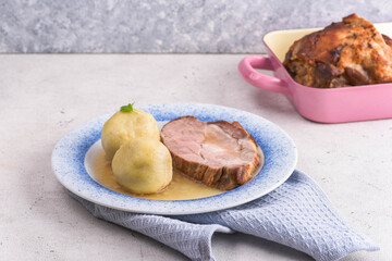 Baked ham with dumplings