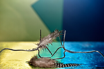 Concept with fork bird on fantasy background 