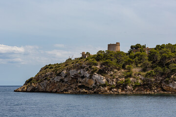 Fototapeta na wymiar ancient tower on the coast of majorca, spain