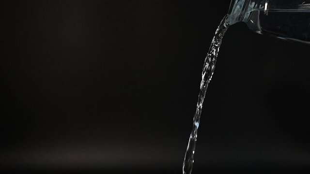 water pouring into a bowl