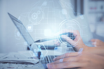 Double exposure of woman hands typing on computer and social network theme hologram drawing. People media concept.