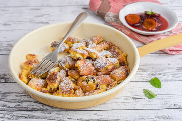 Kaiserschmarren - Austrian dessert with roasted plum sauce