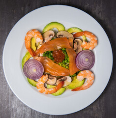 Healthy breakfast with salmon, salad, avocado mushroom, salmon egg, red onion, High quality photo