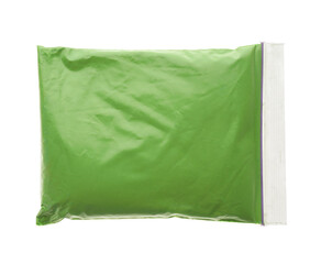 Green powder in plastic bag isolated on white, top view. Holi festival celebration