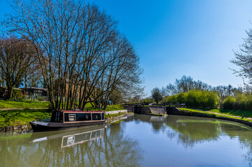 Fototapeta na wymiar A view towards higher set of locks at Hillmorton, Warwickshire, UK on a bright Spring day