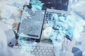 Double exposure of man's hands holding and using a phone and international business theme drawing.