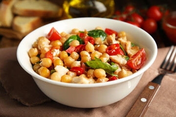 Delicious fresh chickpea salad served on table