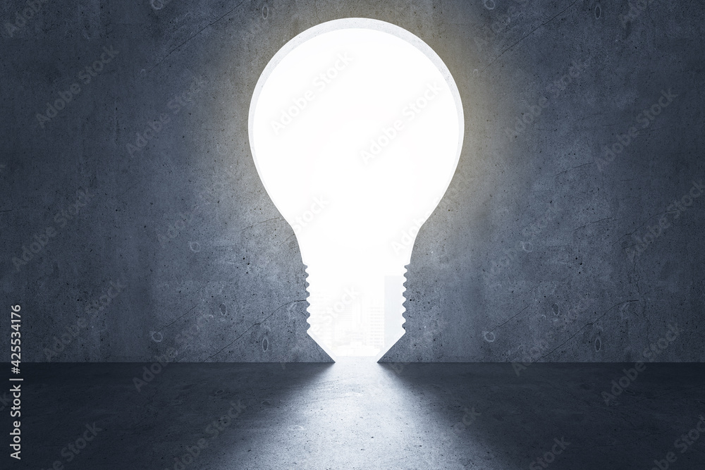 Aufkleber idea concept with big glowing light bulb in dark empty room