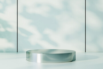 Empty silver round podium on light surface at sunny wall background. 3D rendering, mock up
