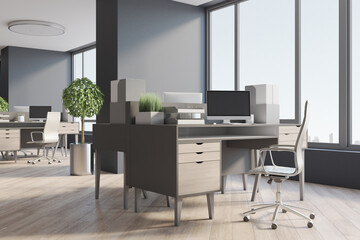 Stylish open space office with modern furnished workplaces, wooden floor, dark walls and city skyscrapers from big window