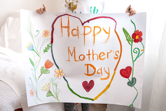 Children's drawing-congratulations to mother's day, painted with paints.