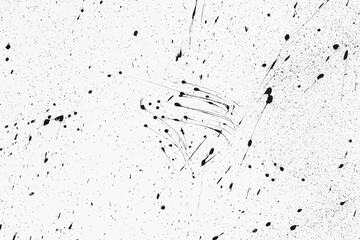 Blots and smudges of black paint on a white background