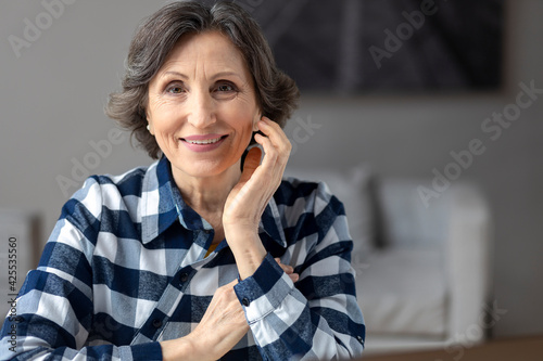 Portrait of a beautiful elderly happy woman