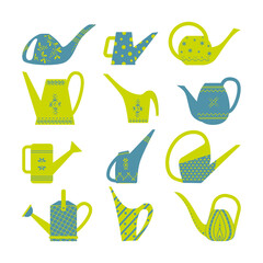 Set of garden watering cans for the garden. Bright watering cans with patterns