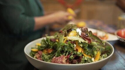 woman preparing cooking making vegetable salad in kitchen