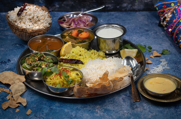 South Indian vegetarian thali meal on blue table