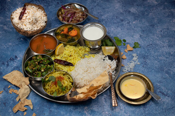 South Indian vegetarian thali meal on blue table