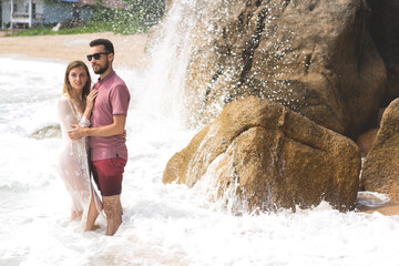 couple in love walking on the beach in Thailand