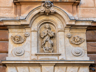 LVIV, UKRAINE - April, 2021: relief decoration on facade of ancient building in the old city.