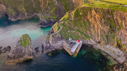 Dunquin Pier Ring of Dingle Kerry Ireland way cliffs coast line Irish touristic landmark sunset amazing aerial scenery view